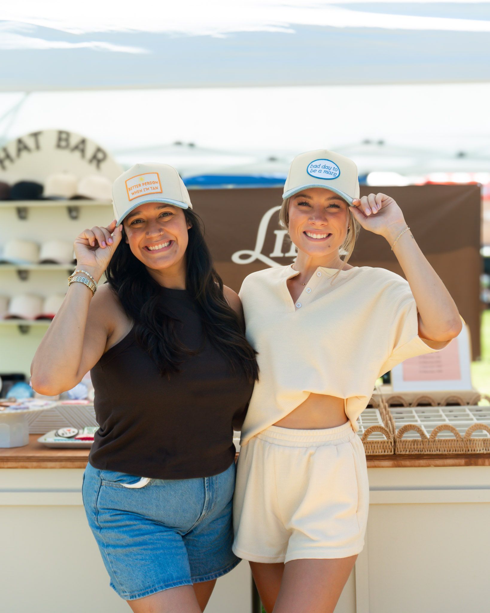 Link and Lid happy customers with customized hats.