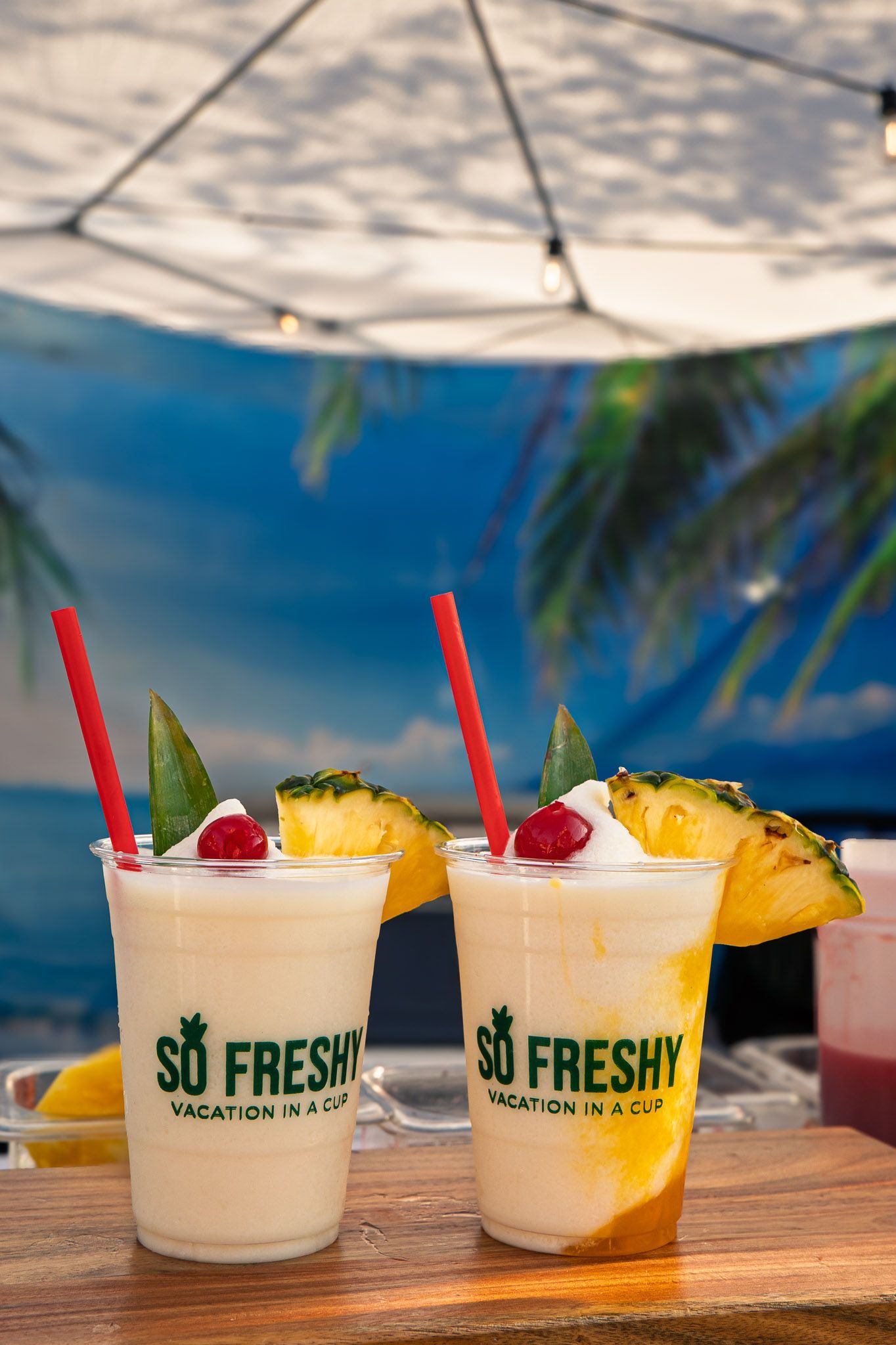 Lifestyle brand photography highlighting So Freshy's handcrafted tropical drinks for marketing and social media.