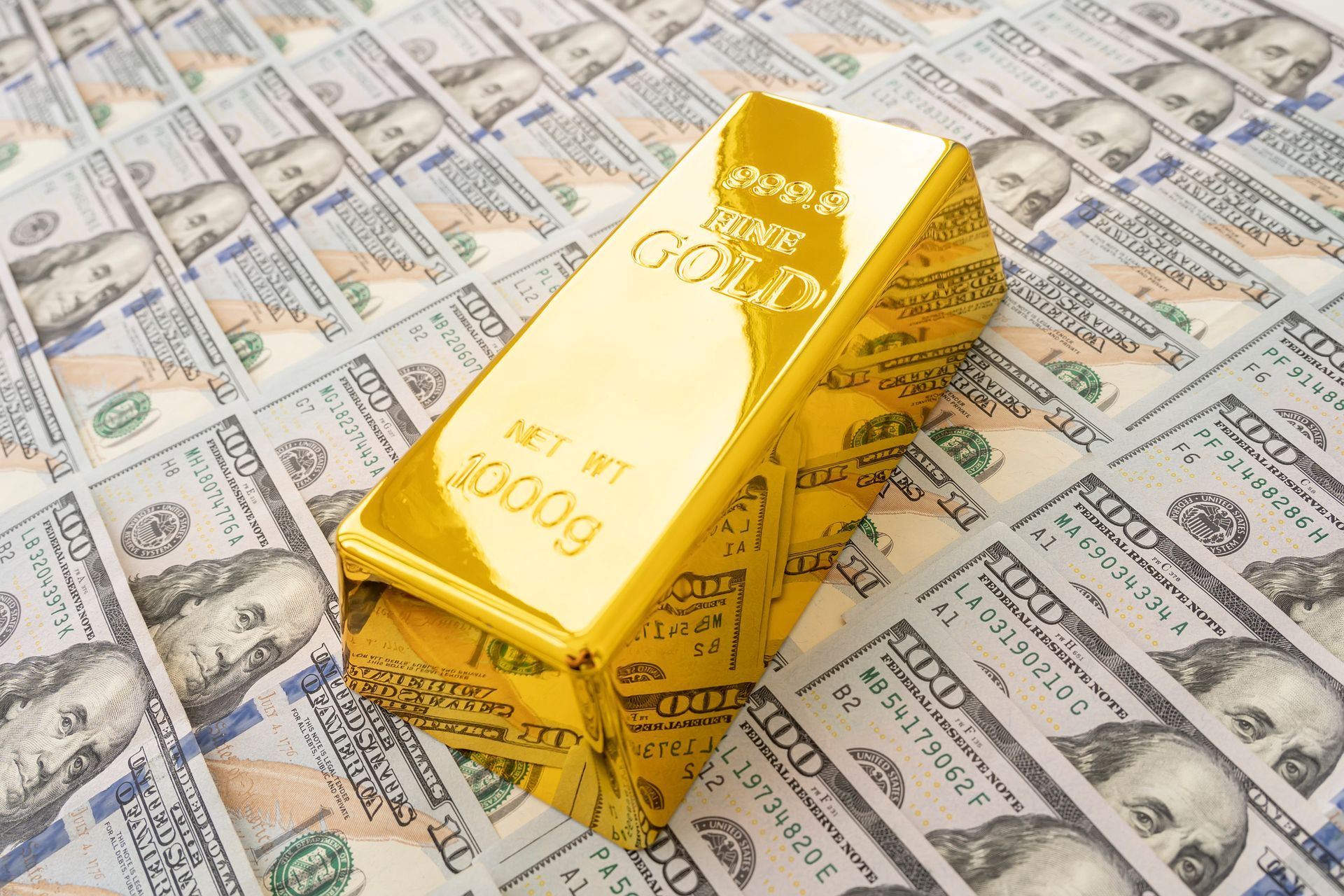 Gold bar overlay money dollars | Gold Buyers | Minneapolis, MN 