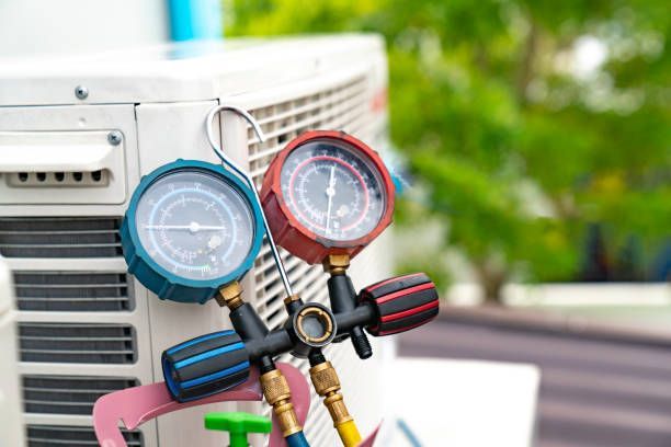 A Couple of Gauges Sitting on Top of an Air Conditioner — Enterprise Air That's Cool in South Kolan, QLD