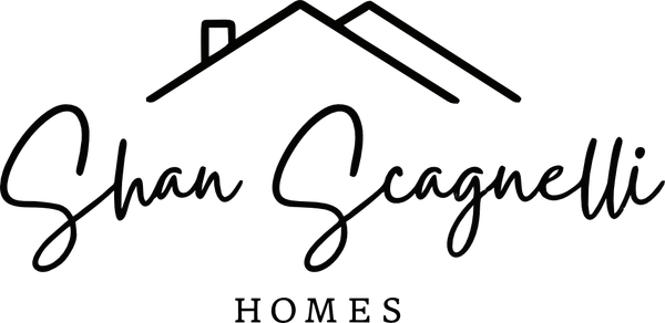 Shan Scagnelli Homes logo with stylized roof line in black text on a white background
