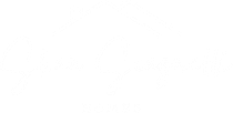 'Shan Scagnelli' in white cursive text with graphic of two roofs and chimney
