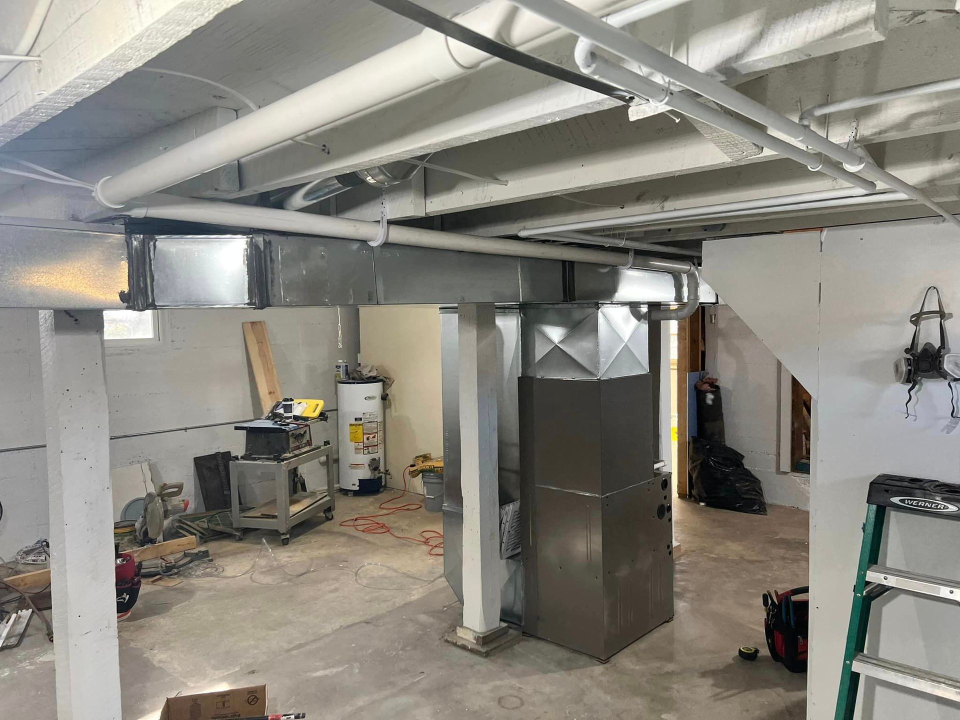 Basement with A Furnace and A Ladder in It | Sullivan, MO | Williams heating and cooling