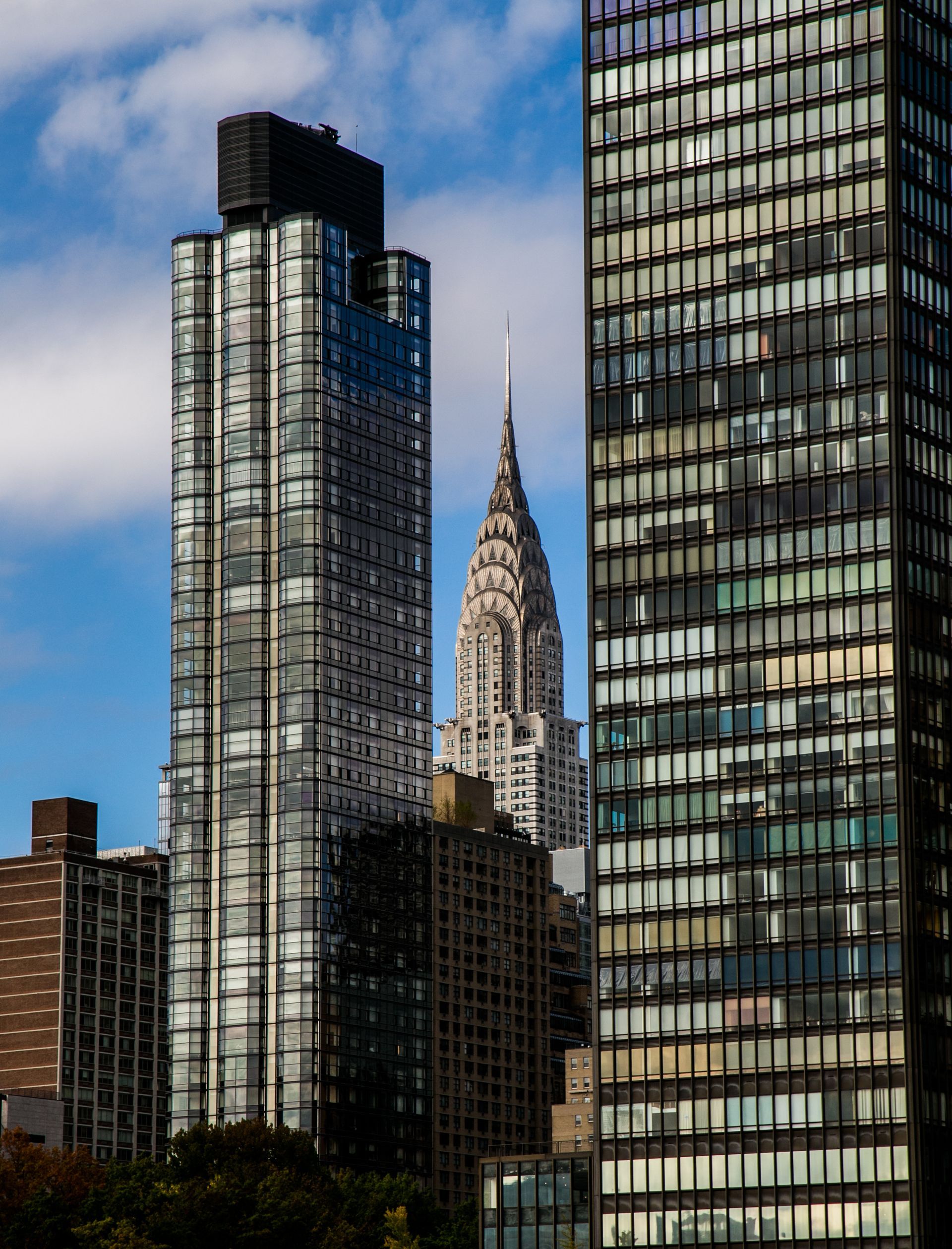 Modern city skyline with two glass high-rises framing a — Las Vegas architecture photography
