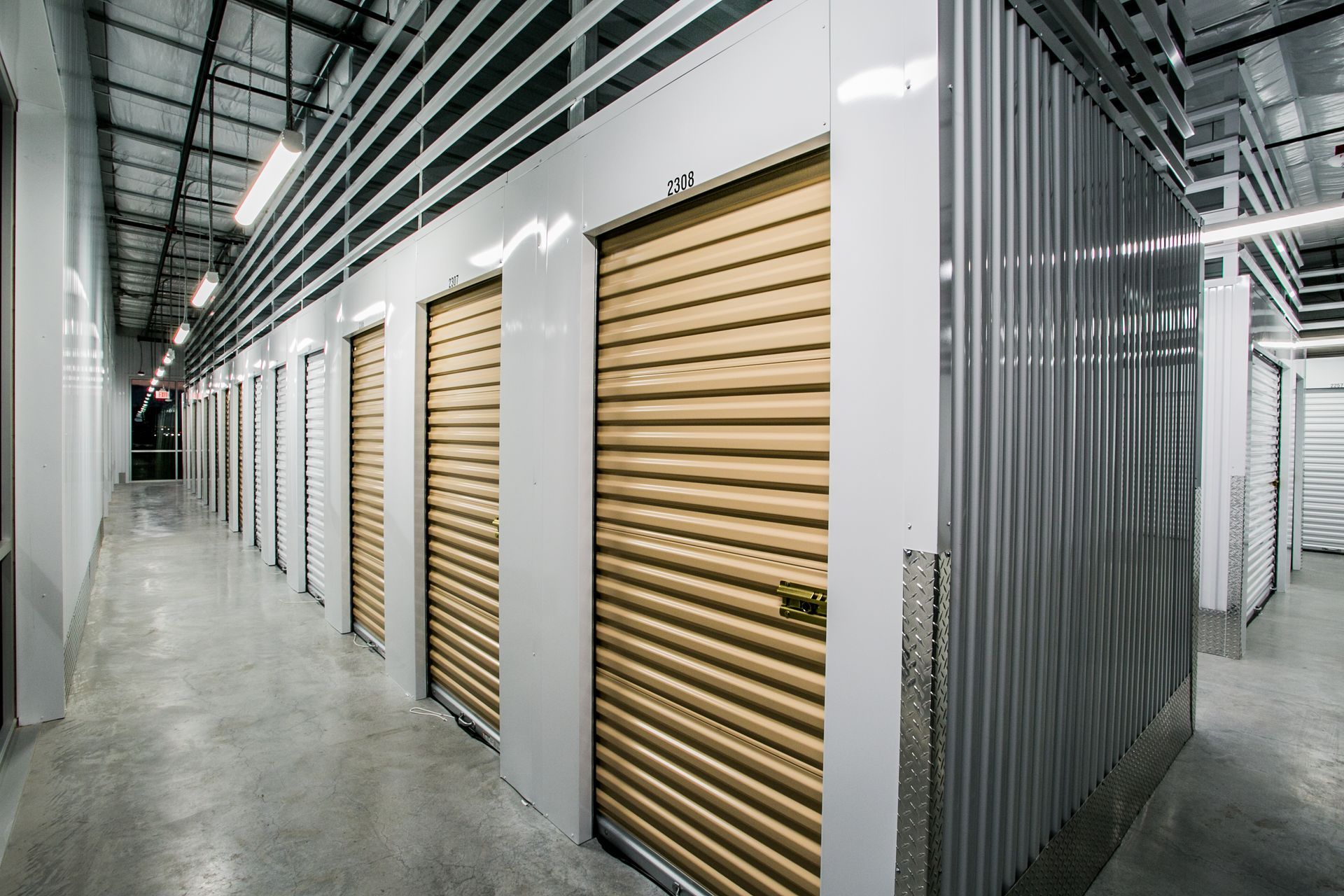 A storage facility aisle with rows of metal unit doors — Las Vegas multi-family photography