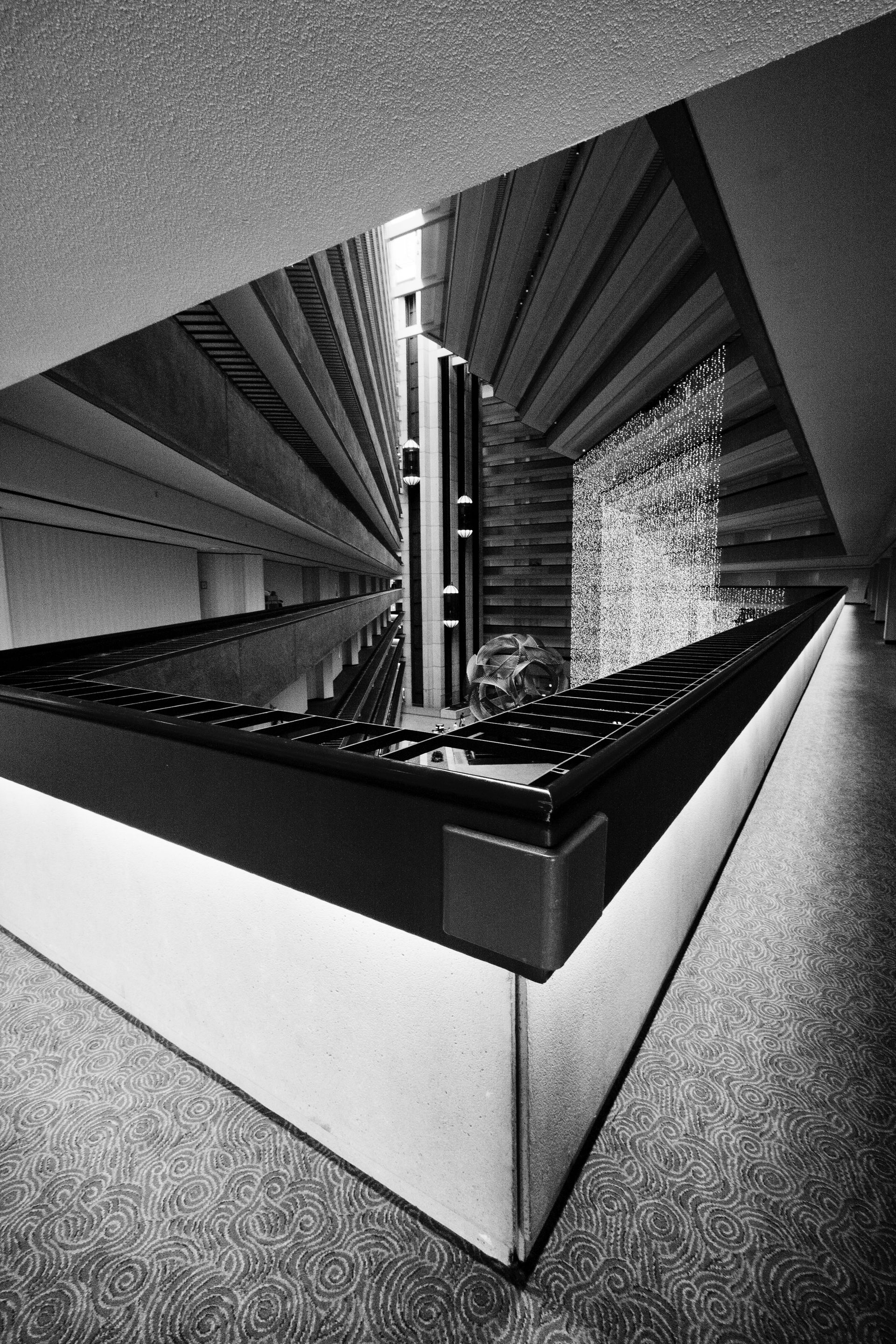 Black-and-white modern architectural interior with a central — Las Vegas architecture photography