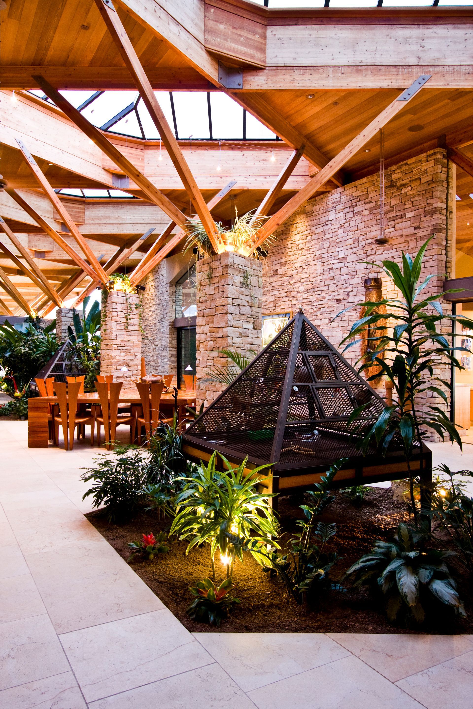 Indoor garden with a glass pyramid planter, wooden beams — Las Vegas real estate photography