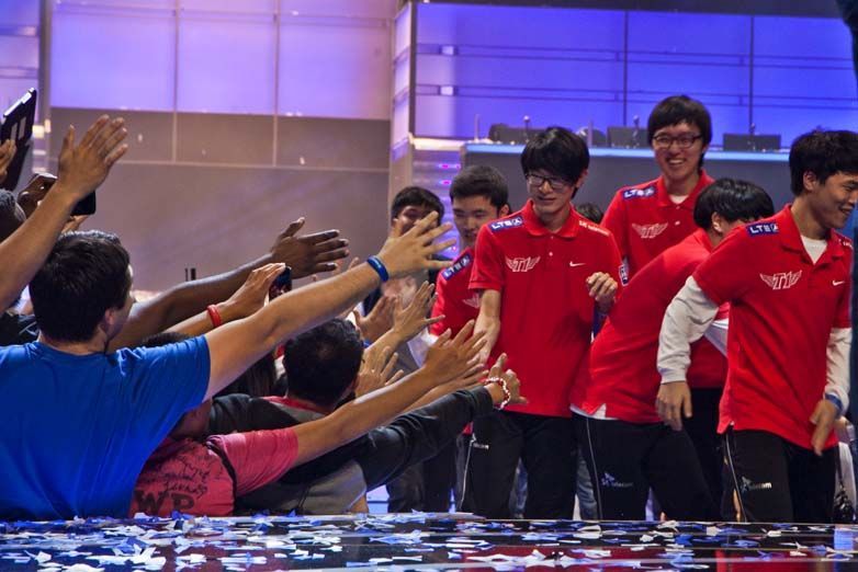 People in red shirts celebrating onstage — Las Vegas event photography