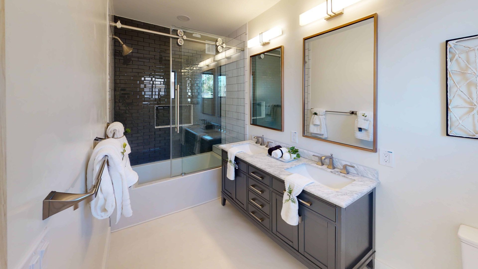 Modern bathroom with nice brown oak cabinets under the sink