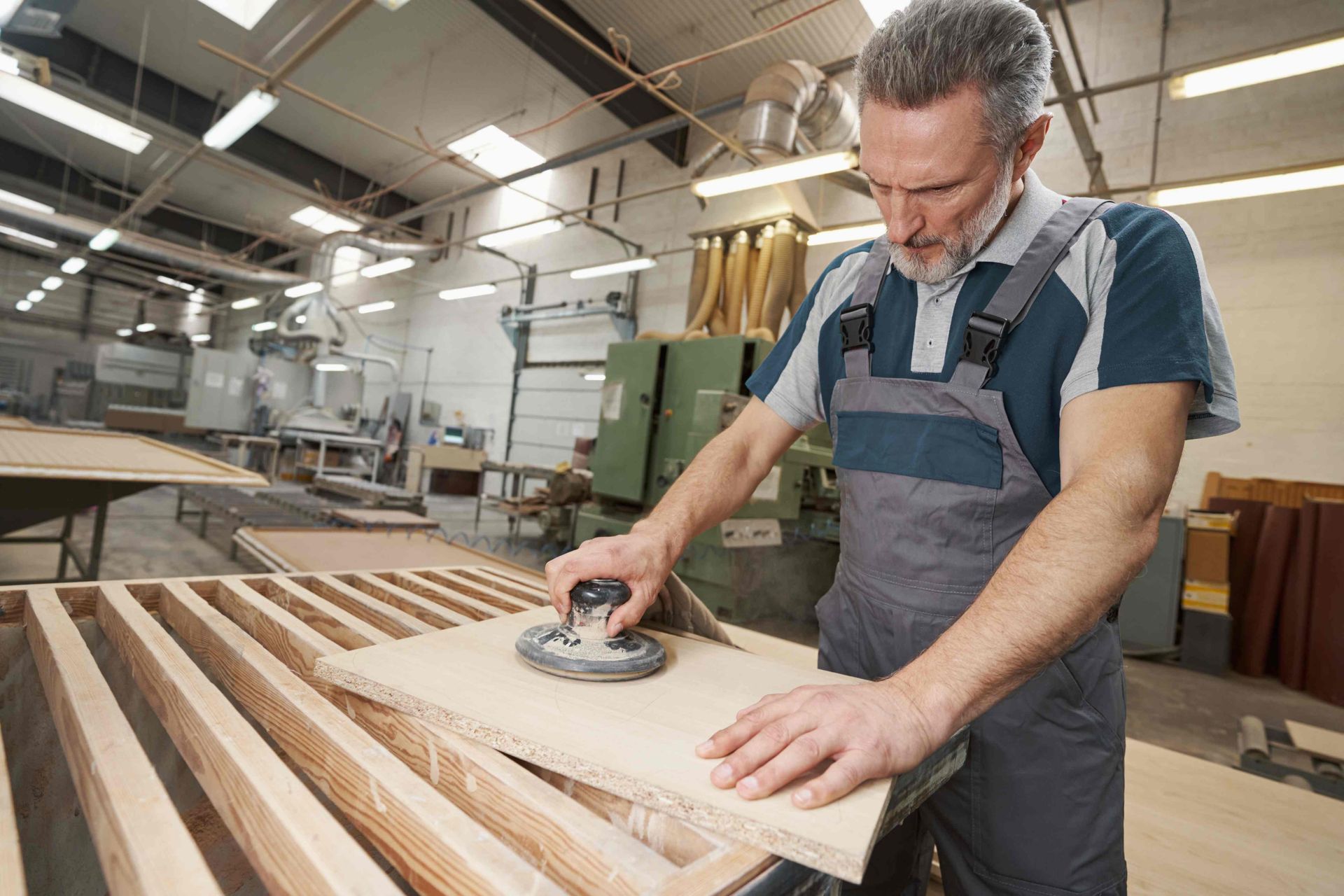 Man building cabinetry