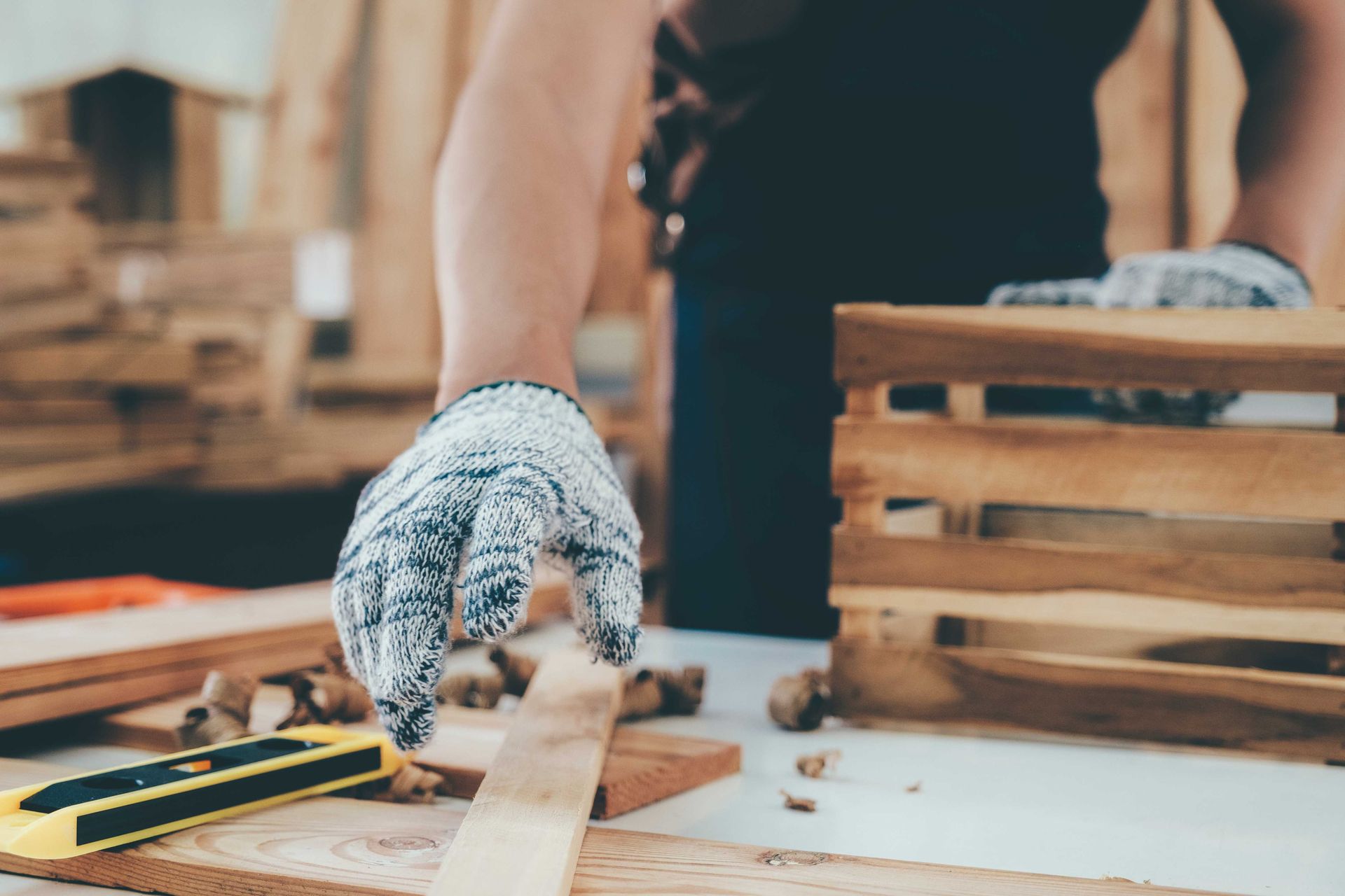 A man constructing cabinets in Thornton Colorado