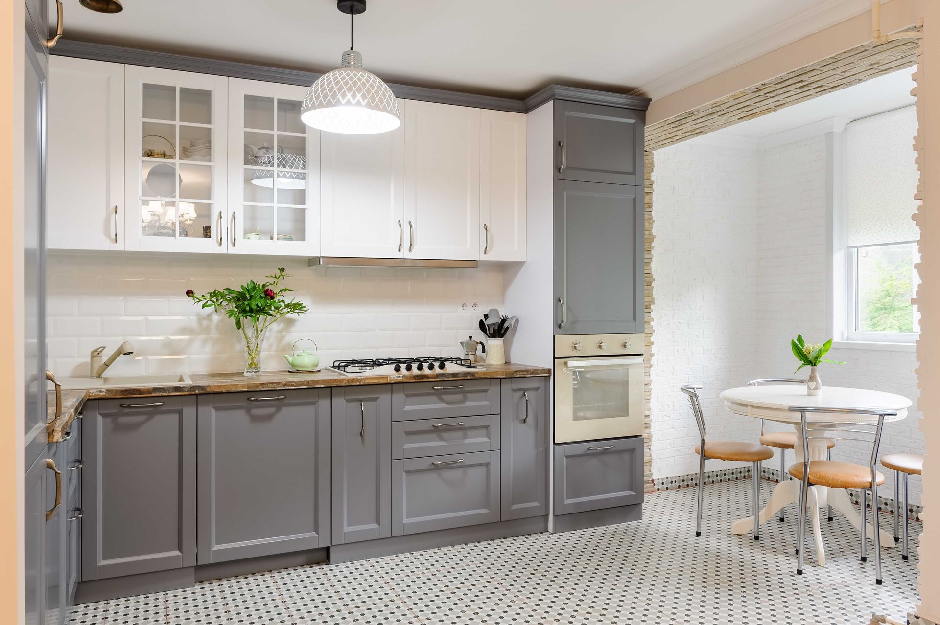 Cabinetry with light brown paint installed for a Colorado family
