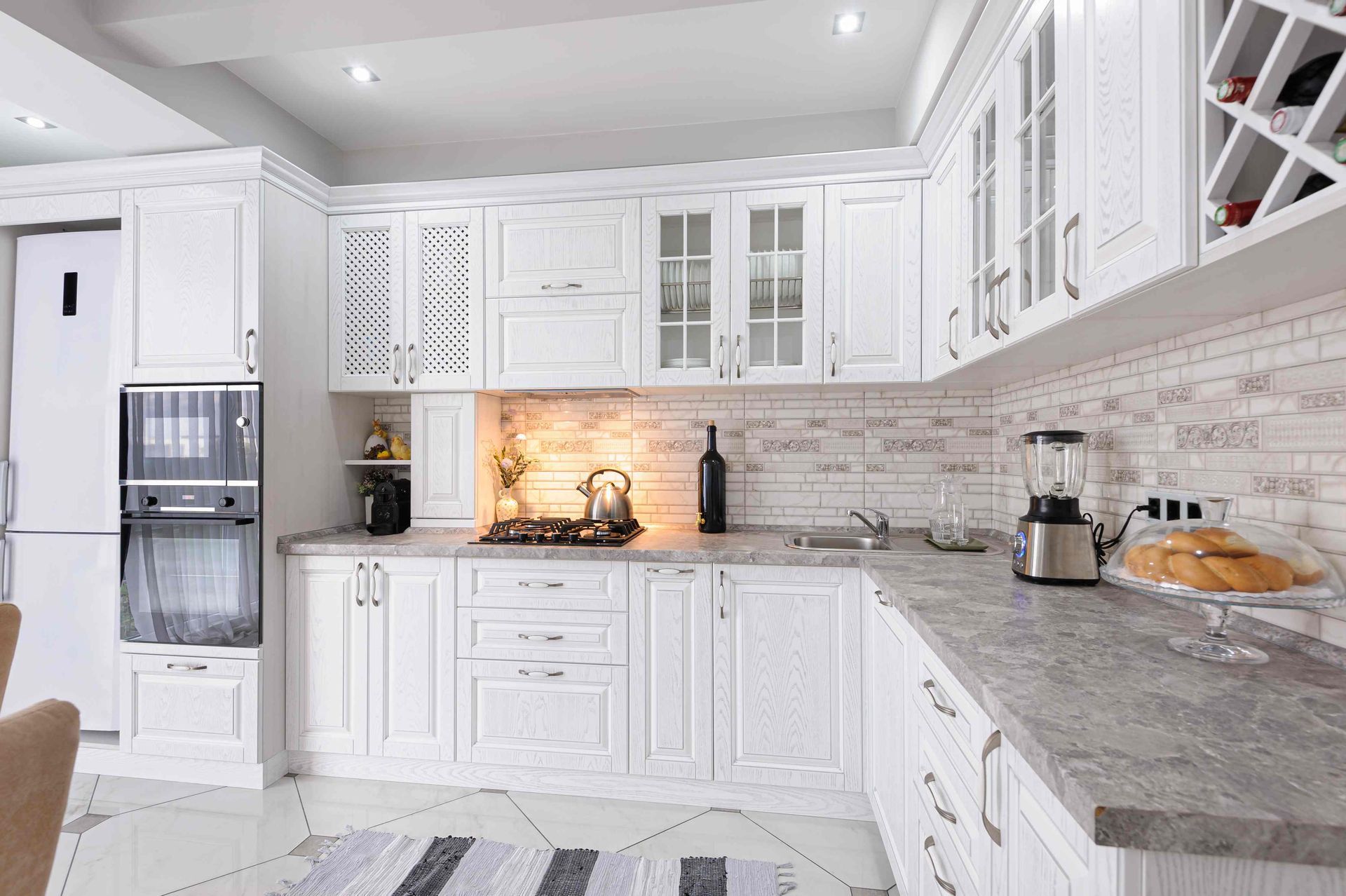 cabinetry in a kitchen painted immaculate white