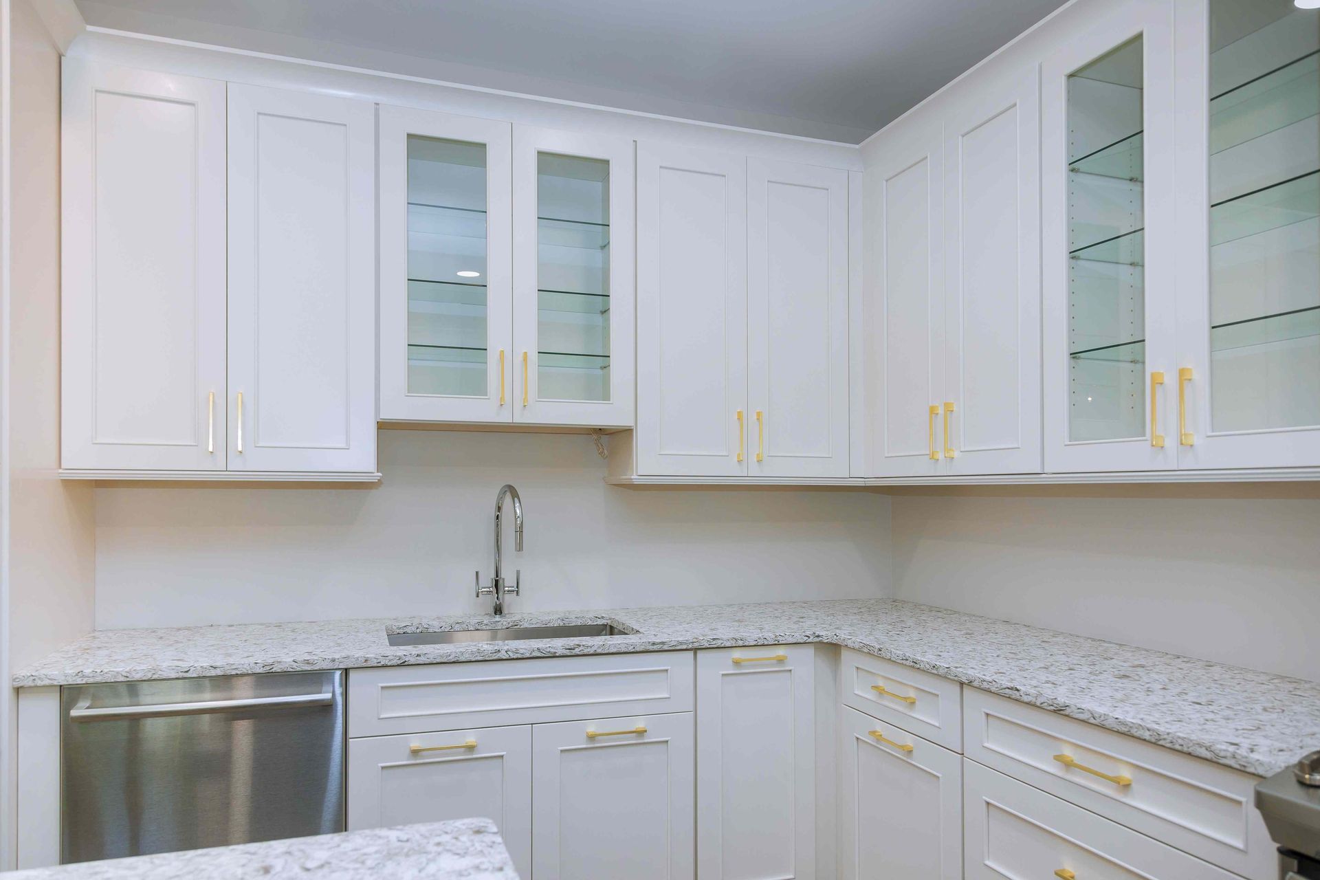 cabinets in kitchen painted a light grey-blue