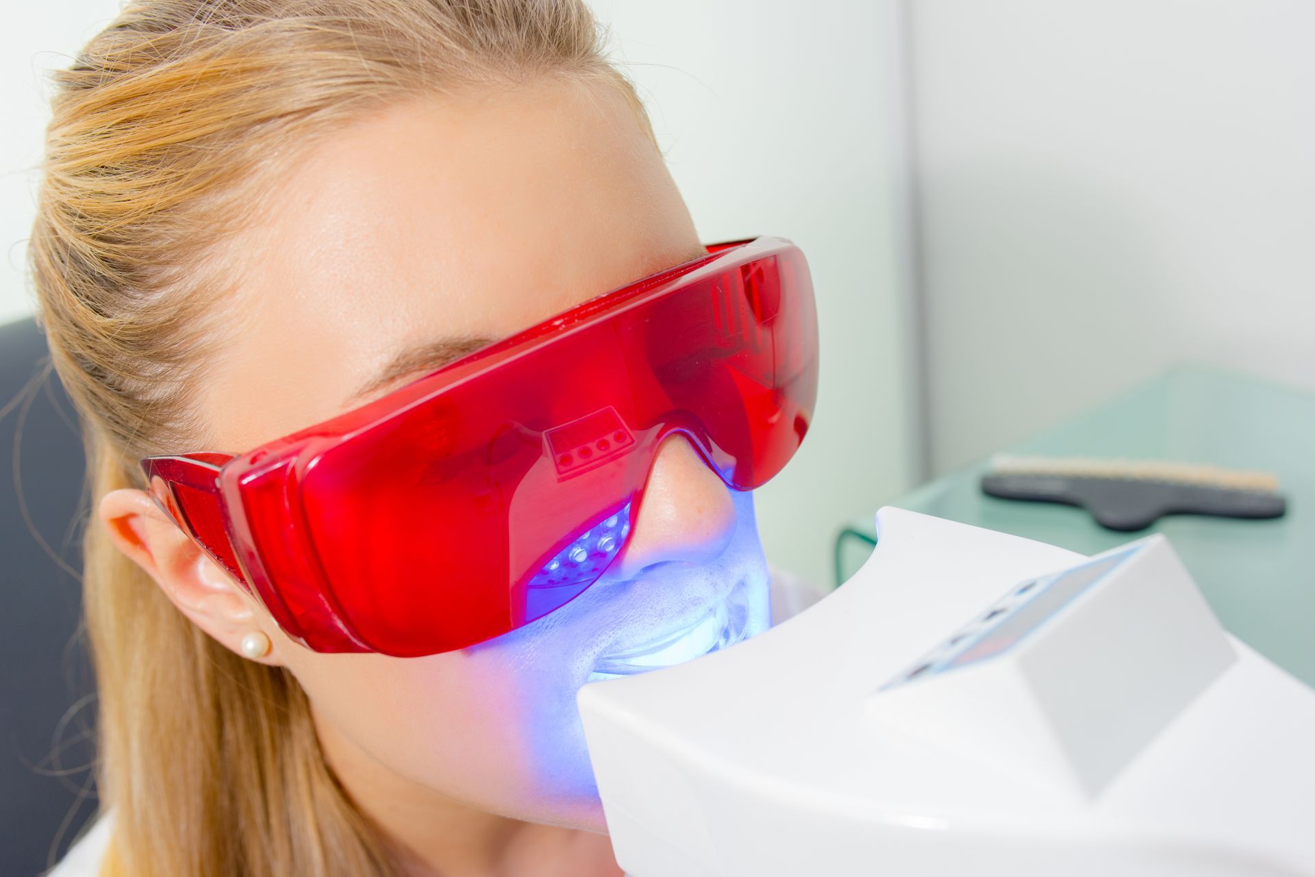 White Teeth — Periodontal Surgery in Tuczon, AZ Periodontist performing non-surgical dental treatment on a patient's gums