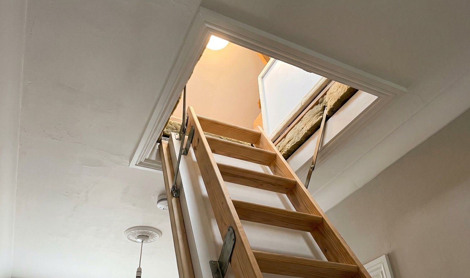Newly installed retractable loft ladder and insulated hatch in Derby home fitted by Derbyshire Specialists Group
