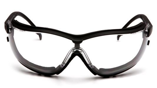 Gafas de seguridad negras y transparentes, con lentes envolventes y patillas.