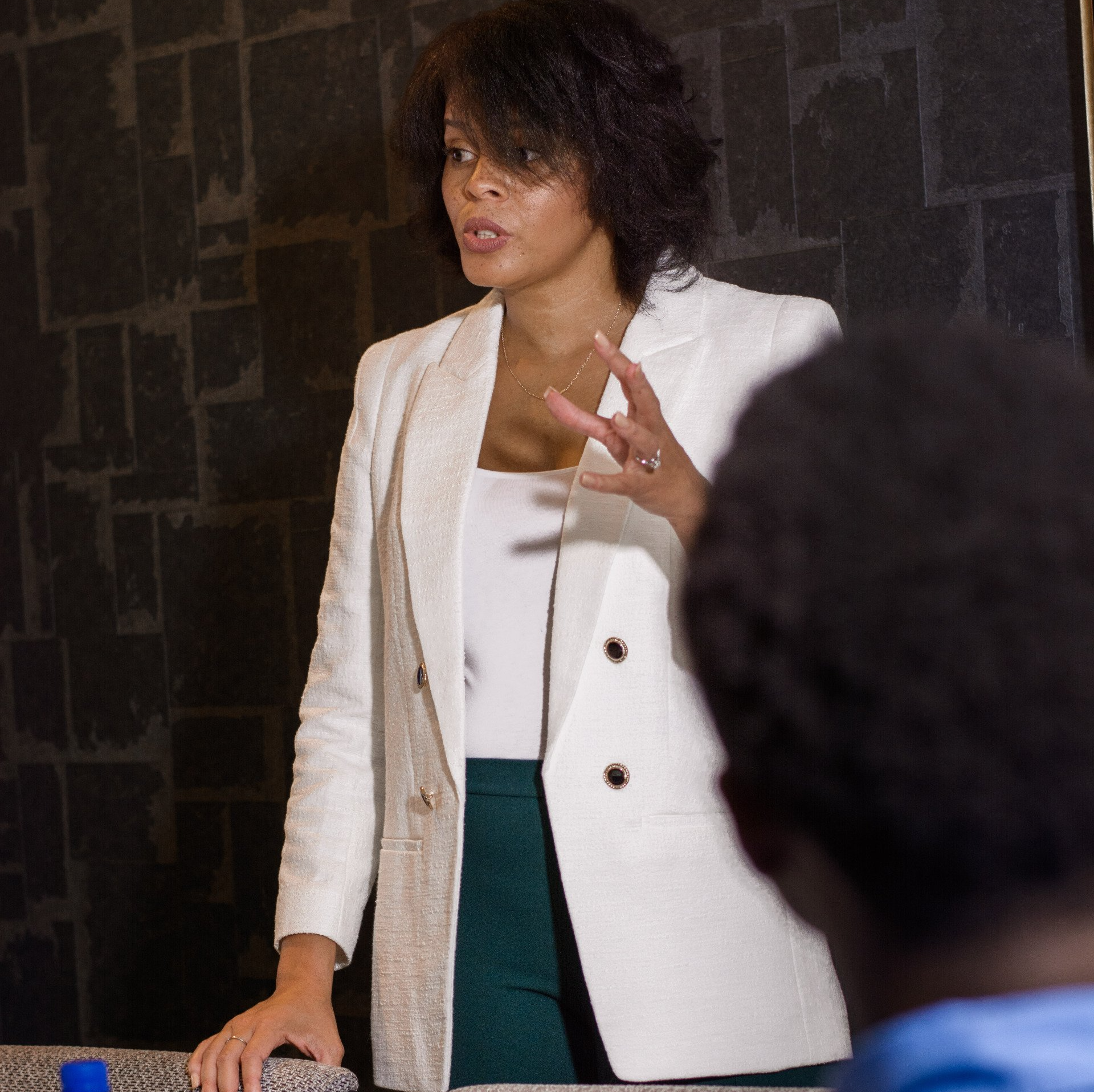Brittaney Jenkins CEO of Jenkins Public Health Consulting speaking to a workshop audience