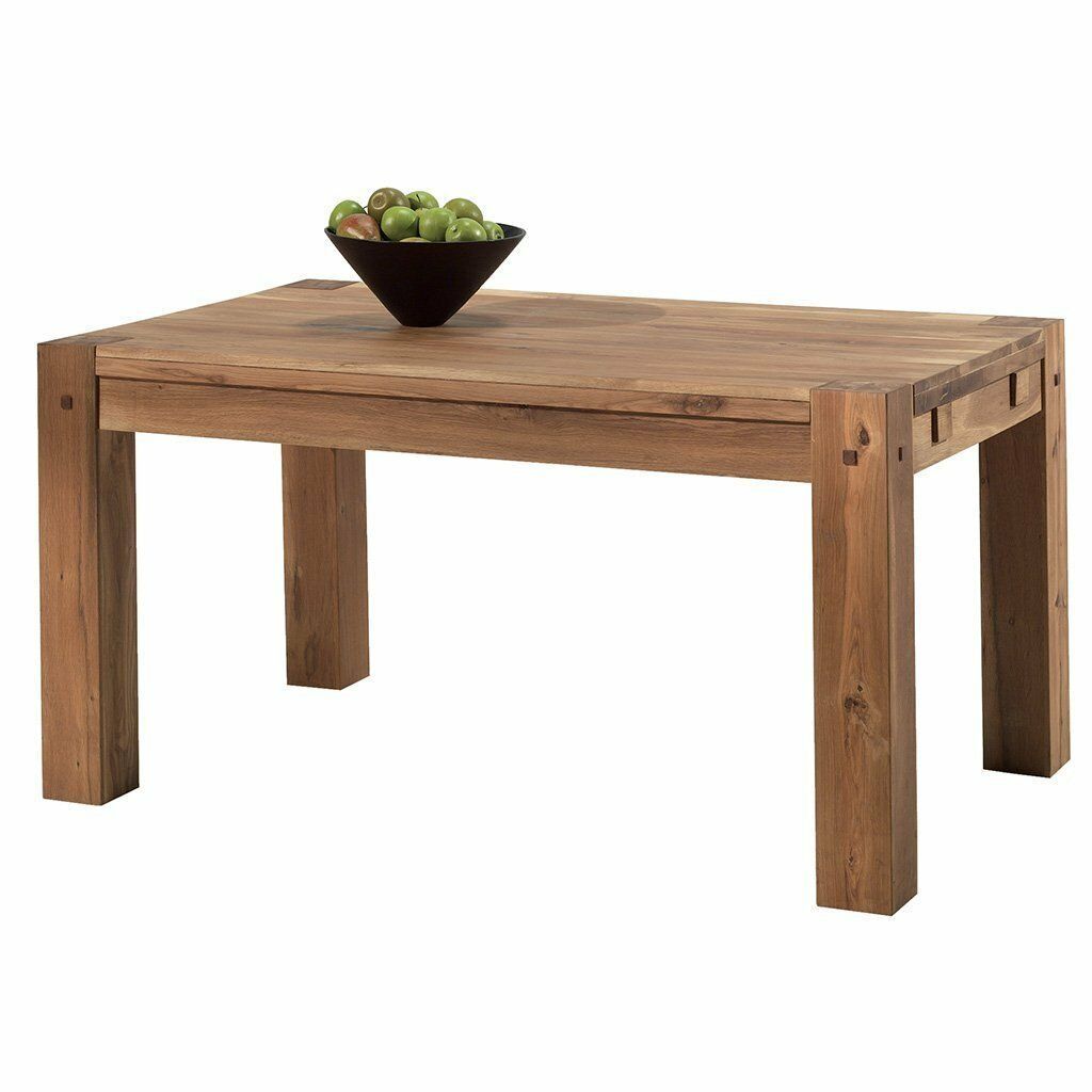 Une table en bois avec un bol de pommes dessus.
