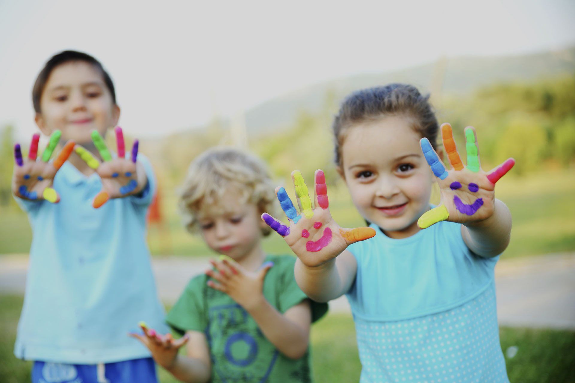 Three kids playing outside Daycare Fayetteville & Spring Lake, NC