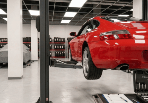 Porsche 911 on the lift at Autos of Europe in Manchester, MO