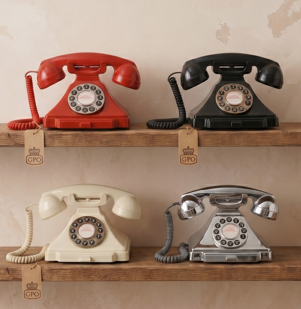 Four vintage retro phones in red, black, cream, and chrome on wooden shelves