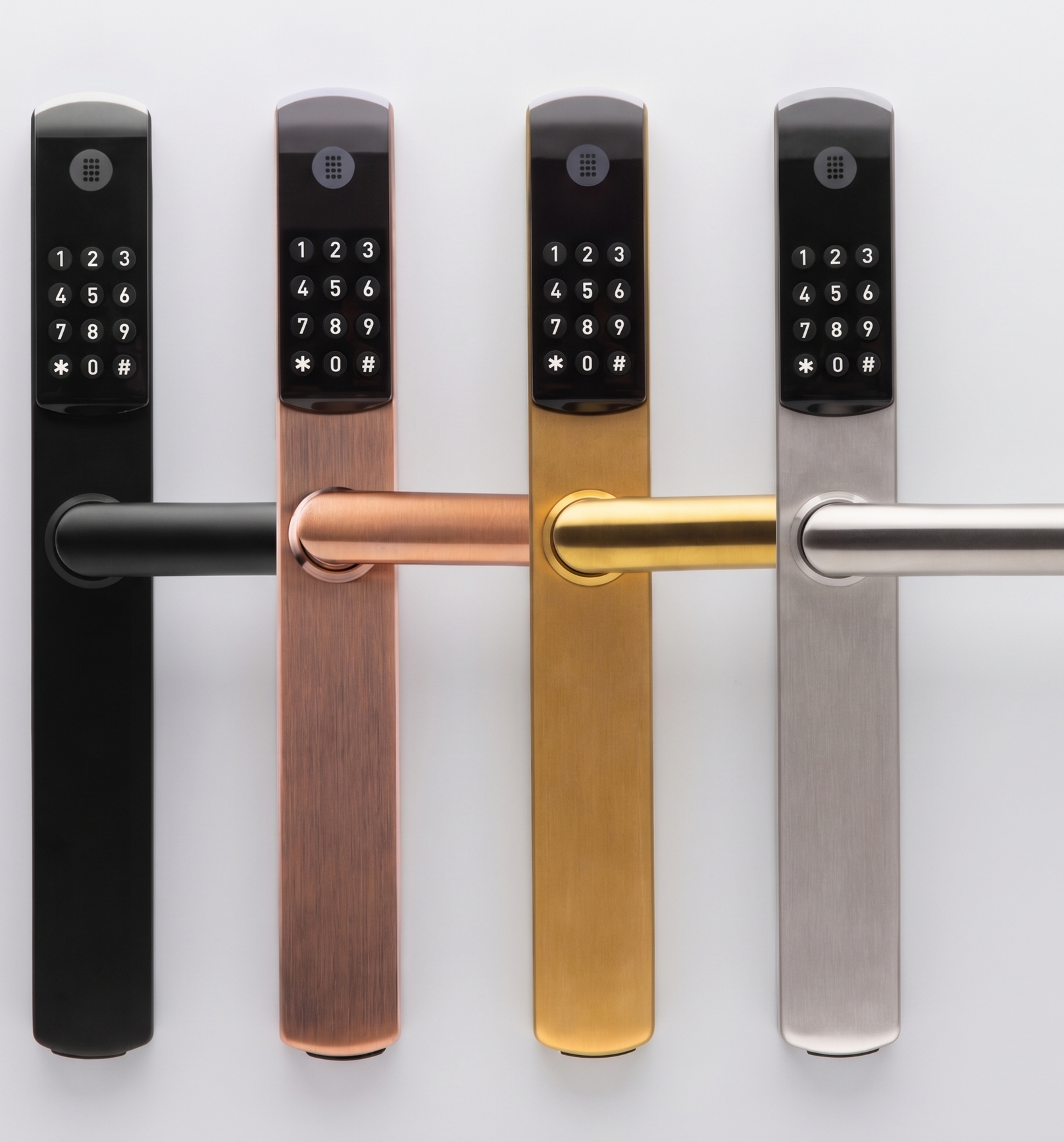 Four modern keypad door handles in black, copper, gold, and silver on a light background.