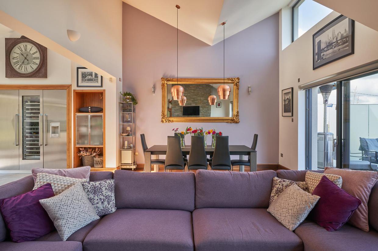 Kitchen, dinning and living room of the 'Galtee Lodge' located in 'Howth, Dublin' designed by 'Dublin Design Studio'