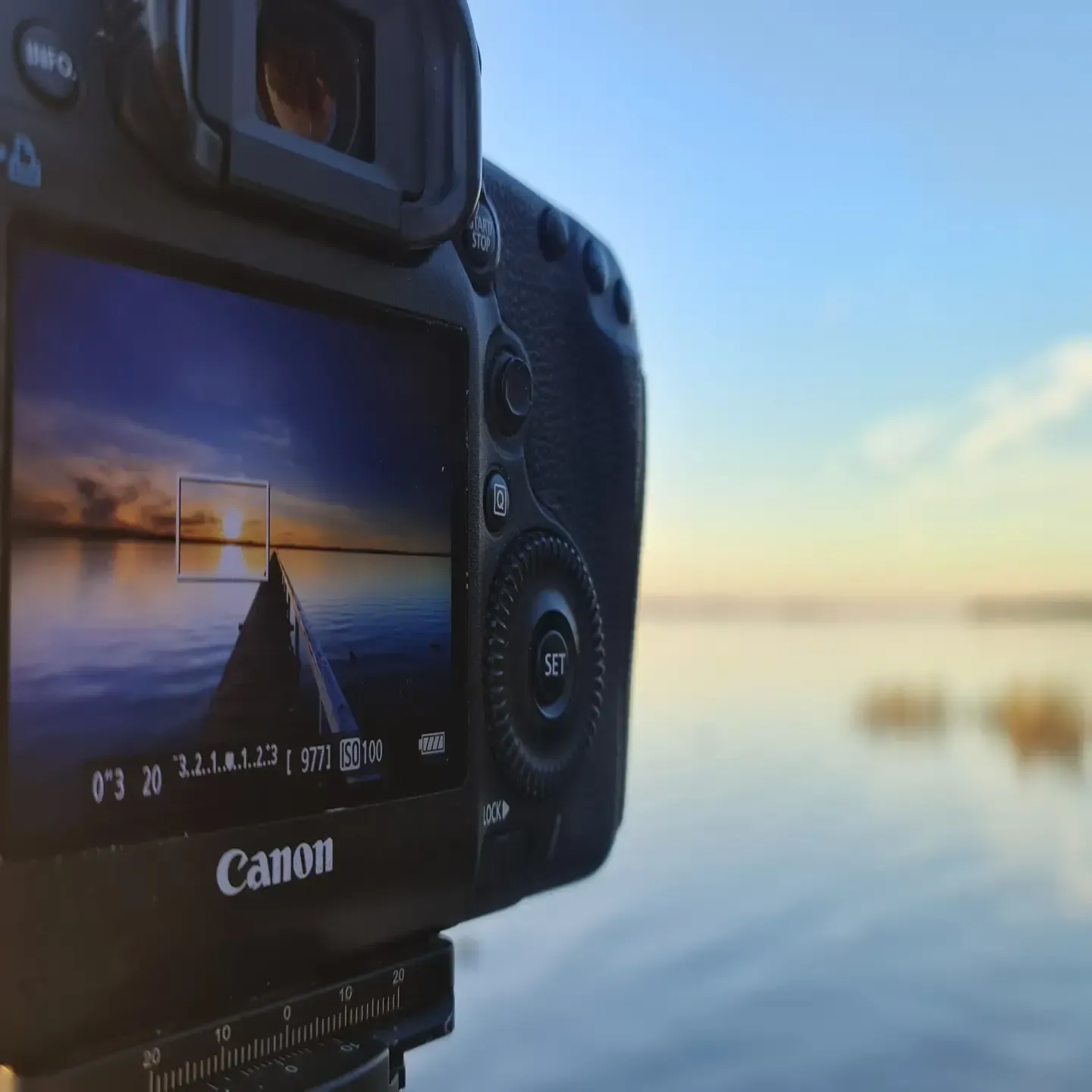 Canon Camera Photographing a Sunset Over Calm Water — Craig Stevens Photography in Sydney, NSW