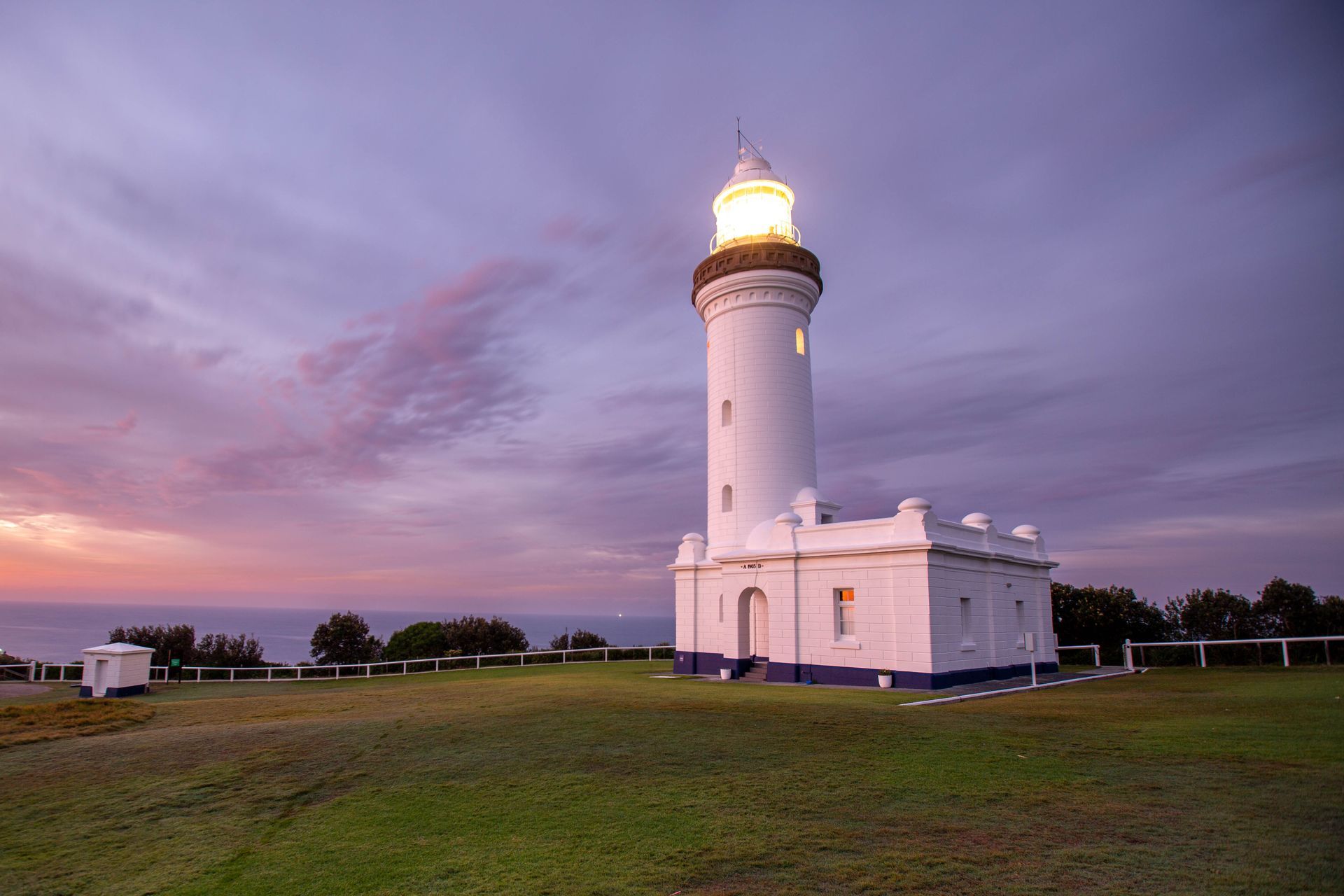White Lighthouse At Dusk On A Grassy Coast Under A Sky — Craig Stevens Photography in Pearl Beach, NSW