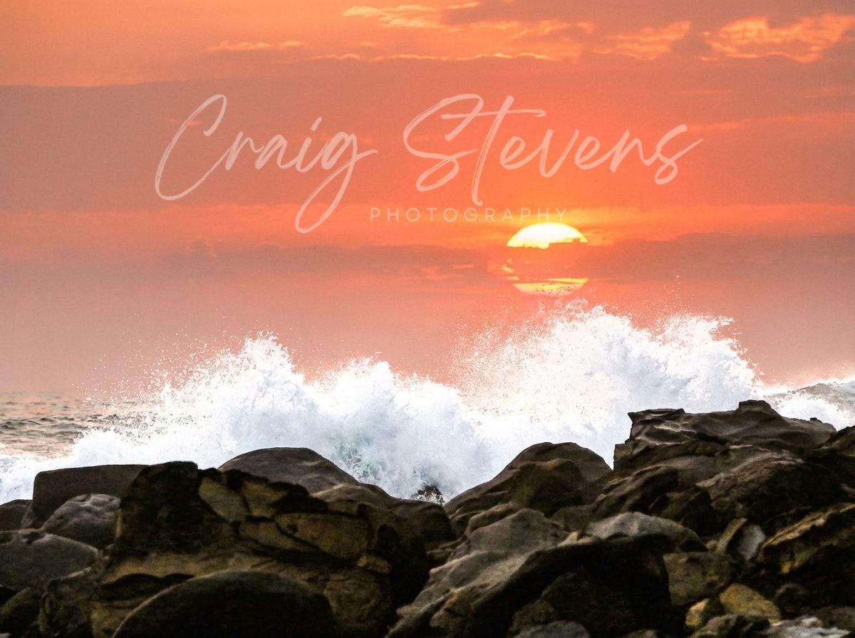 Ocean Waves Crash Against Dark Rocks At Sunset With Orange Sky — Craig Stevens Photography in Pearl Beach, NSW