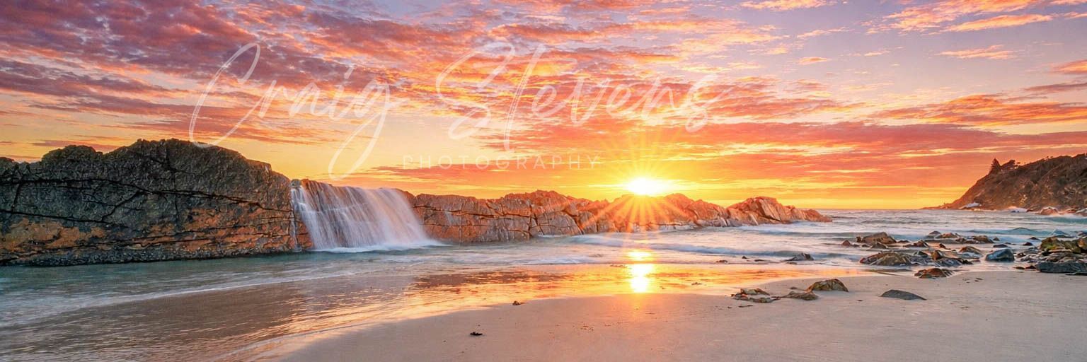 Sunset Over a Sandy Beach with Cliffs, Waves, and A Glowing Orange Sky — Craig Stevens Photography in Pearl Beach, NSW