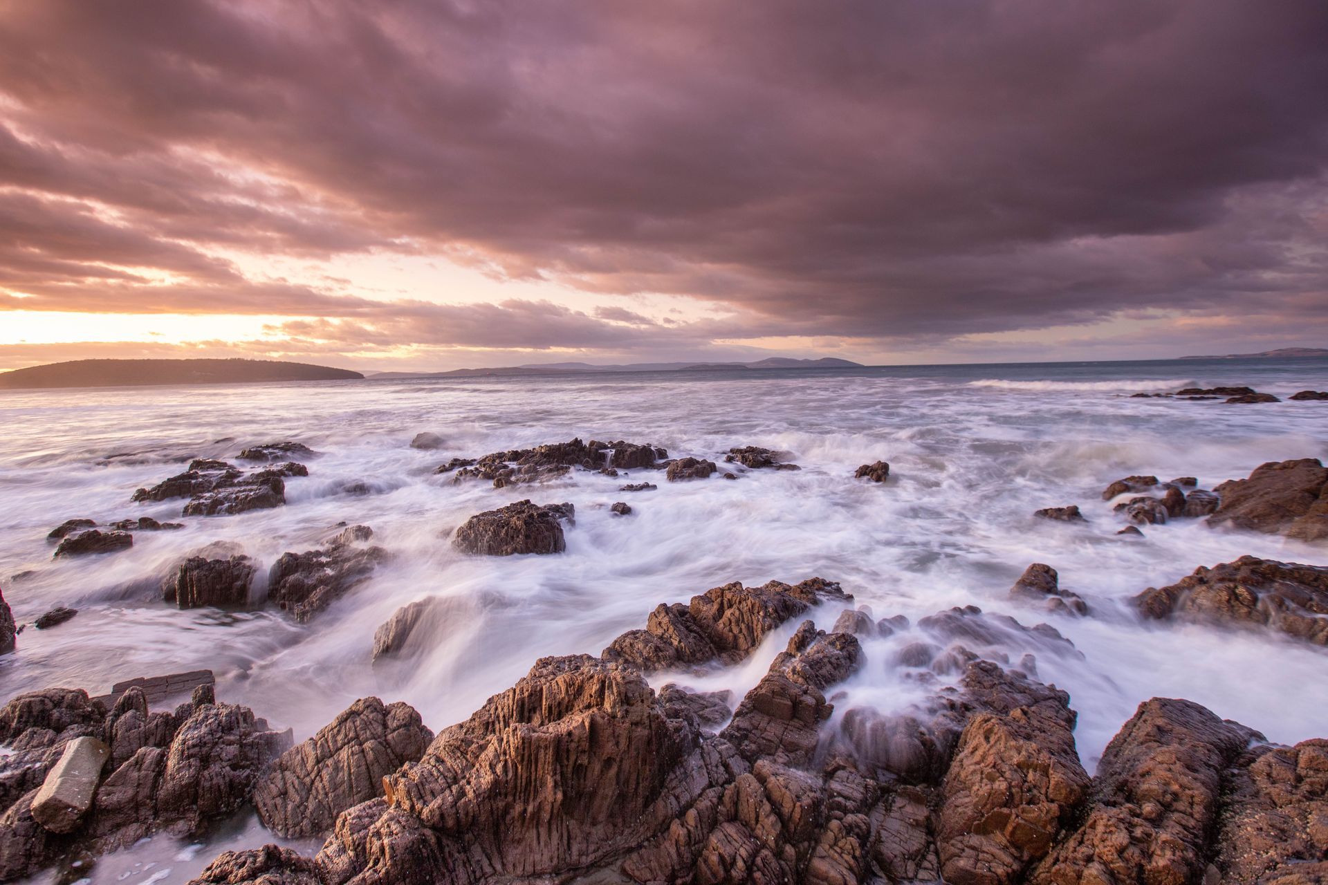 Rocky Shoreline With Waves Crashing Under A Dramatic Sunset Sky — Craig Stevens Photography in Pearl Beach, NSW