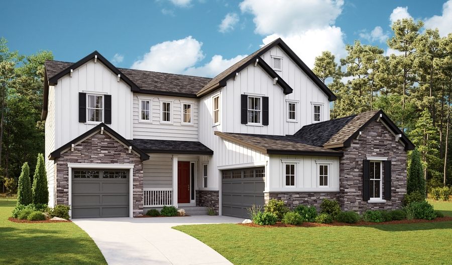 A large white house with black shutters is sitting on top of a lush green lawn.