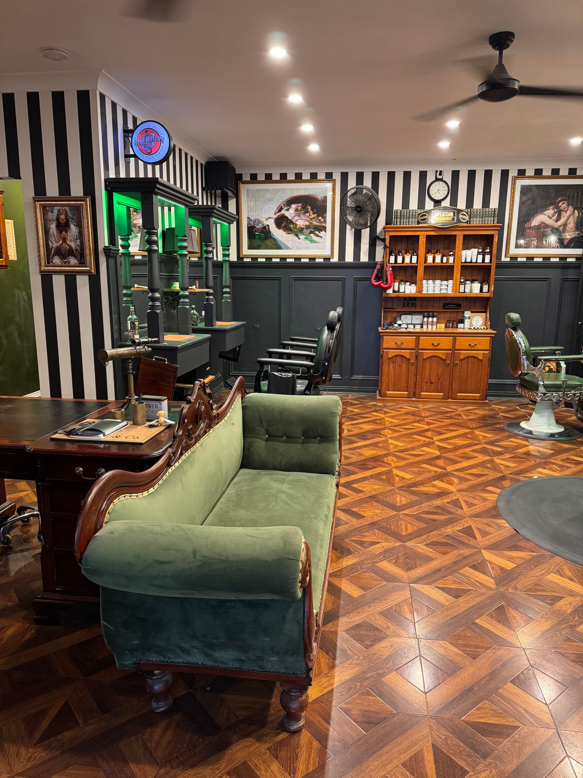 A Woman is Getting Her Hair Cut at a Barber Shop — Connolly & Co Barbers In Robina, QLD