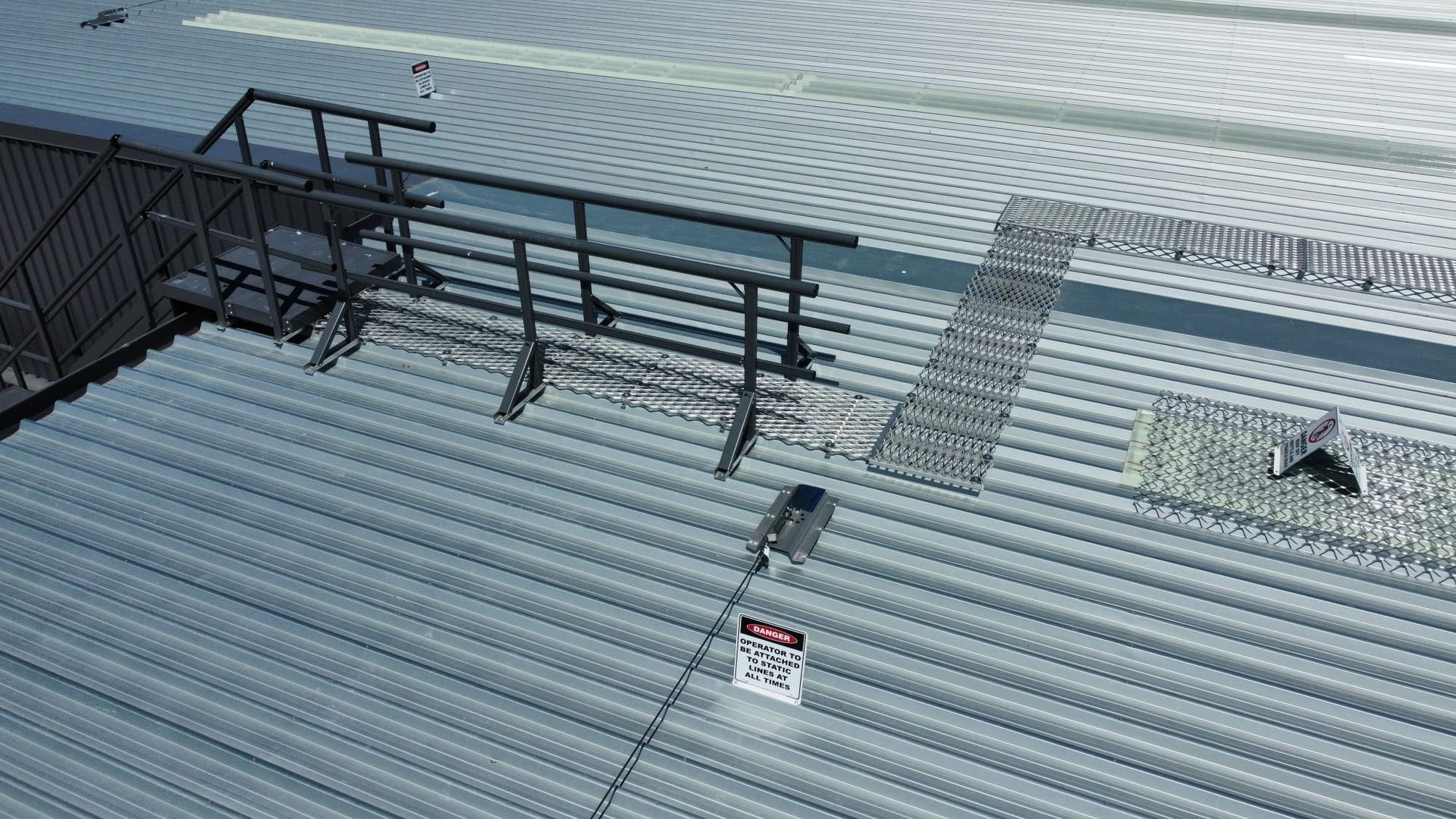 Elevated walkway platform with stair access - height safety load compliance exlained