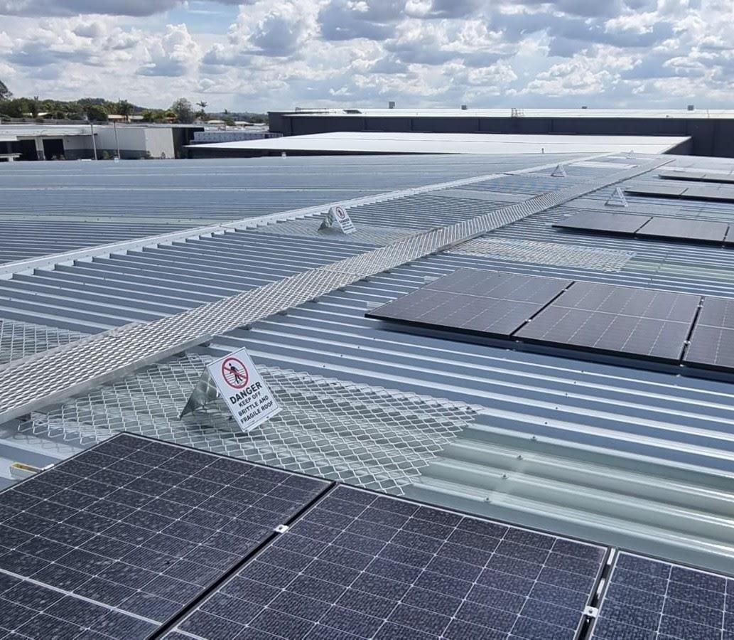 Roof walkway installation for solar panel maintenance access