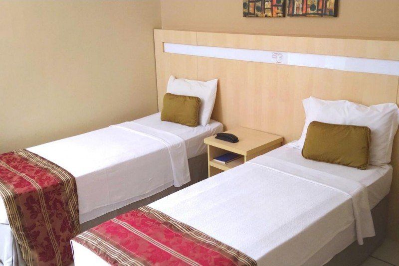 2 camas de solteiro do quarto luxo duplo