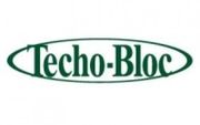 Techo-Bloc logo in green text inside an oval outline