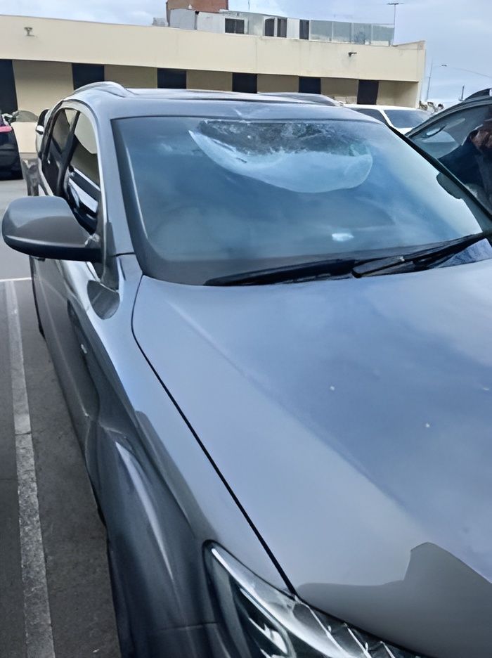 A Gray Car is Parked With a New Replaced Windscreen — A1 CarGlass In Nambour, QLD