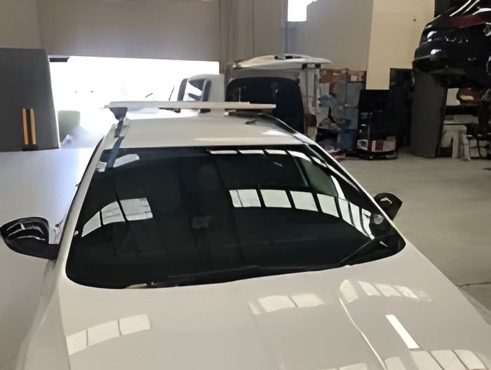 A White Car With a Replaced Windscreen — A1 CarGlass In Coolum, QLD