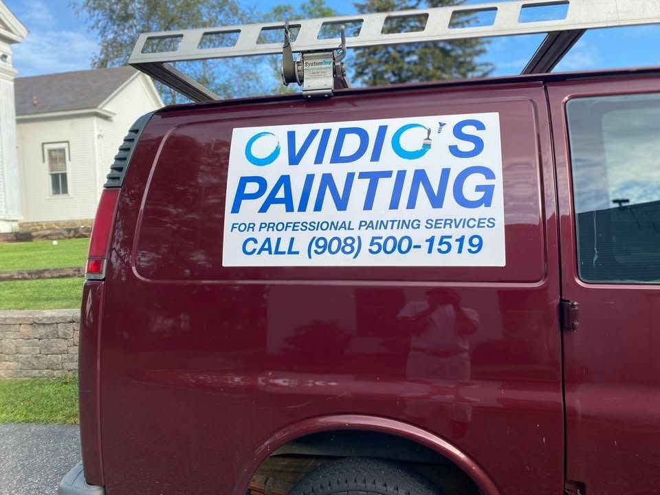 Burgundy van with 