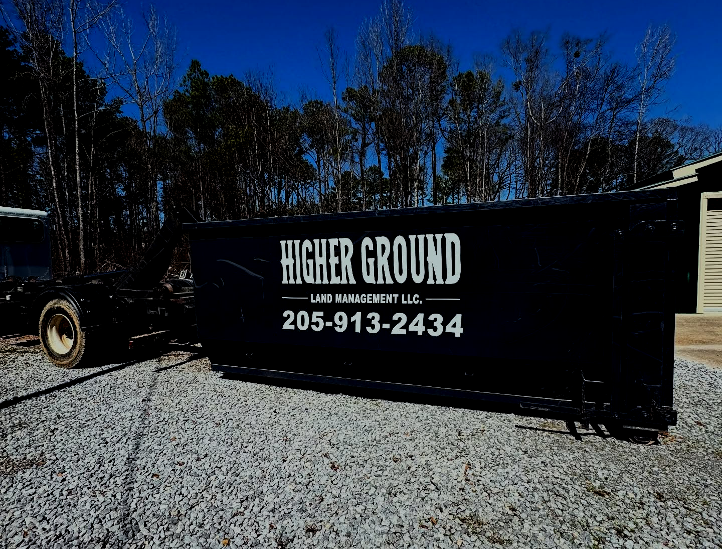 Black dumpster with 