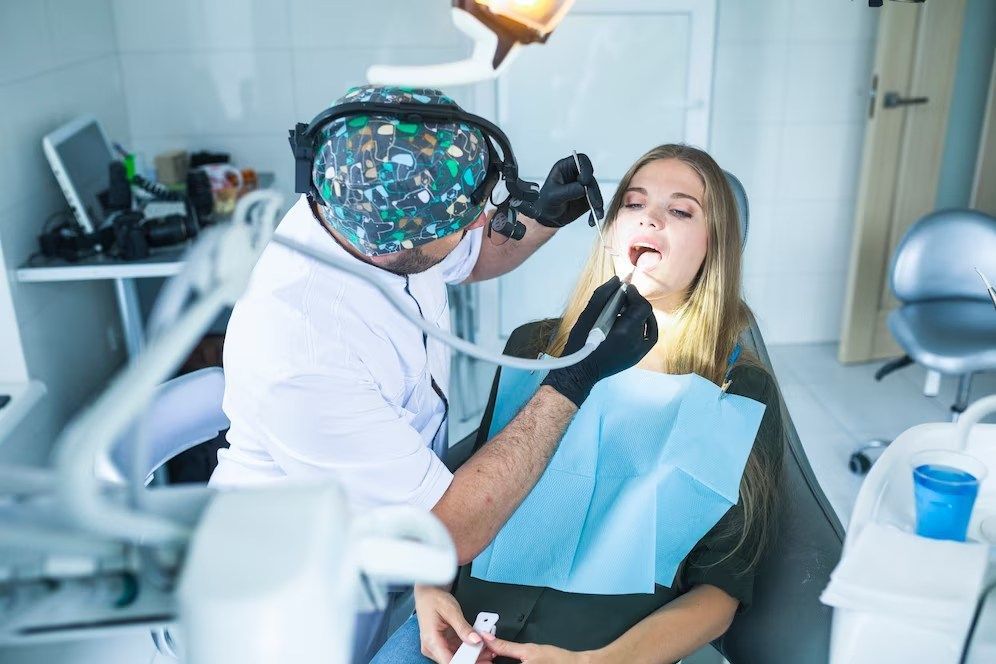 Dentist examining a patient's teeth