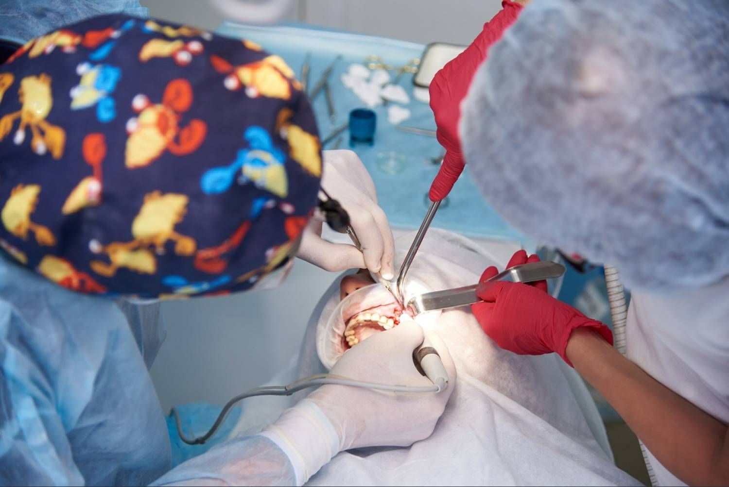 A dentist is performing surgery for a sinus lift