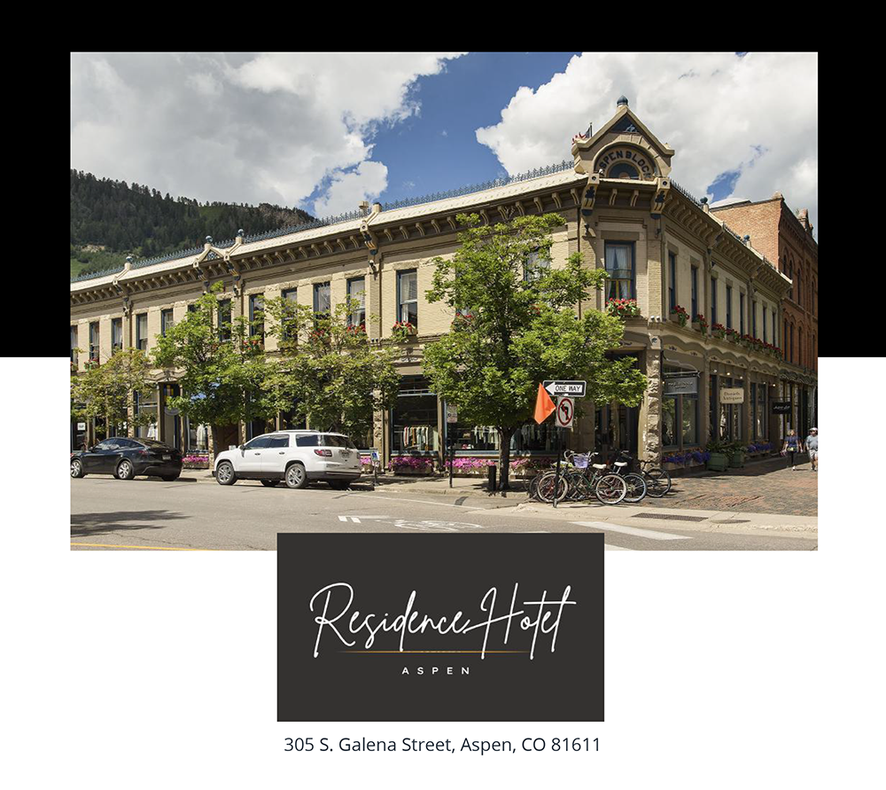 Residence Hotel building in Aspen, Colorado, with storefronts and a logo at the bottom.