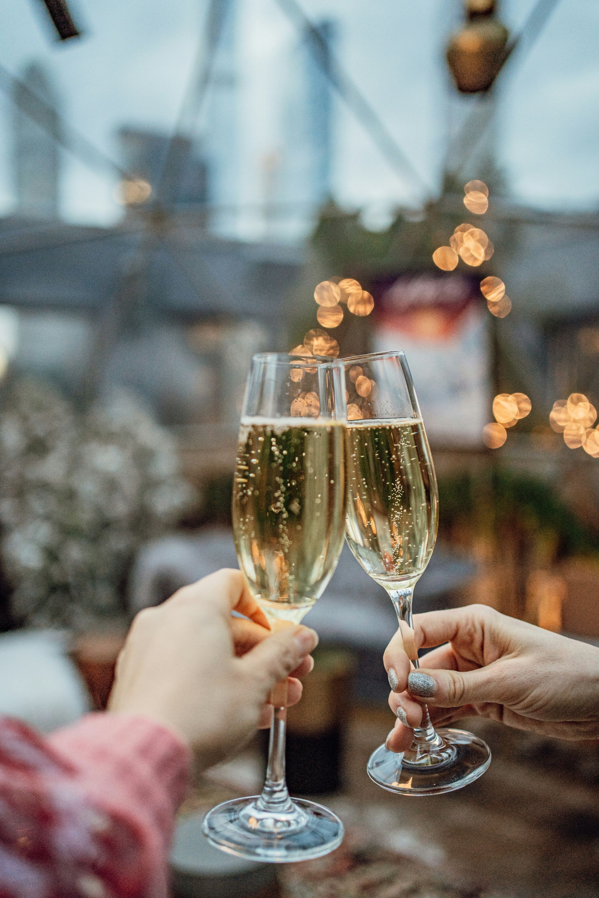 Champagn Glasses being raised for a cheers. 