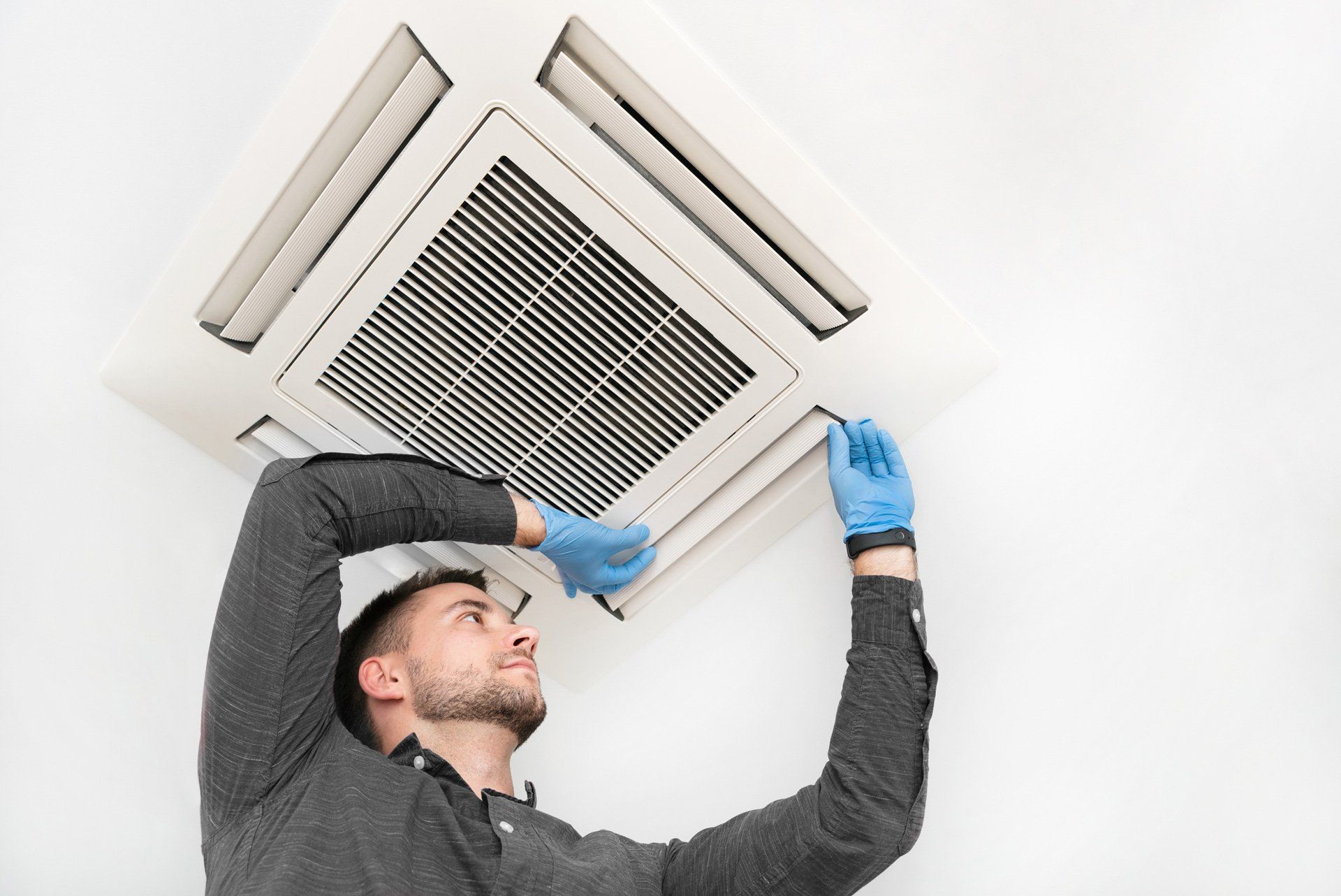 Technician Checking Air Conditioning — Langwarrin, VIC — Southside Plumbing Heating & Cooling