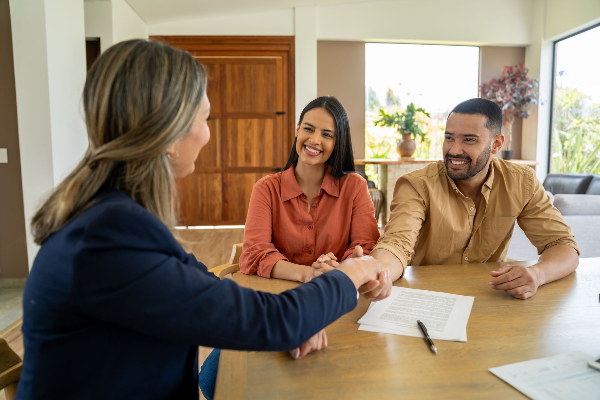 Landlady And Tenant Shaking Hands — Insurance in San Antonio, TX Landlady And Tenant Shaking Hands — Insurance in San Antonio, TX