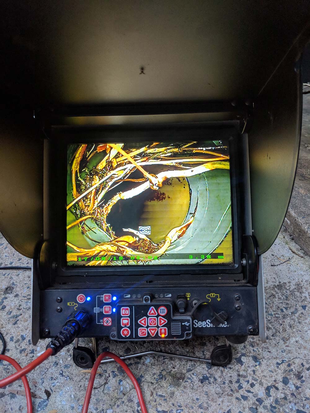 Plumber's Checking The Sewer Drainage Using The Camera — Antony Garrett Plumbing Services In Childers QLD
